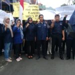 NasDem Trenggalek gelar aksi damai menolak isu merger dengan Gerindra. (Foto : Bayu Krisna, NewsTujuh.id)